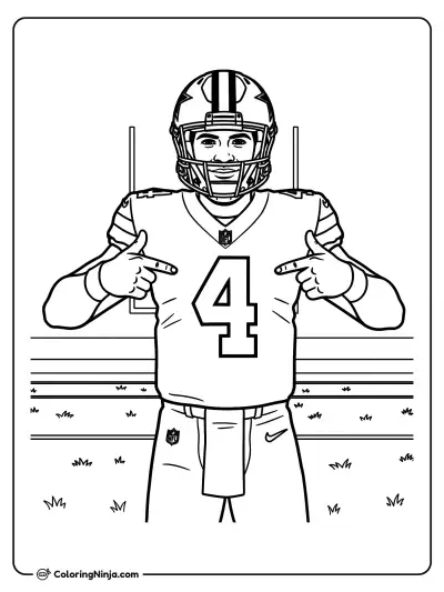 Dak Prescott señalando su uniforme